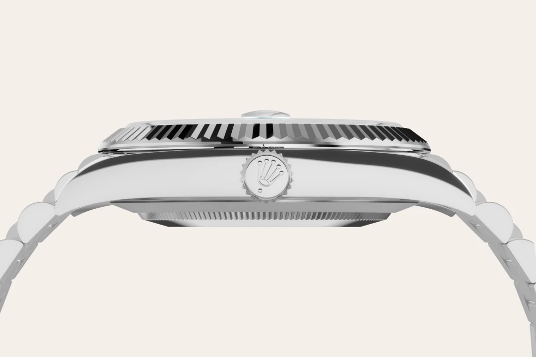Rolex Day-Date 40 in platinum with an ice blue dial, fluted bezel, and President bracelet, m228236-0018 - Crisson