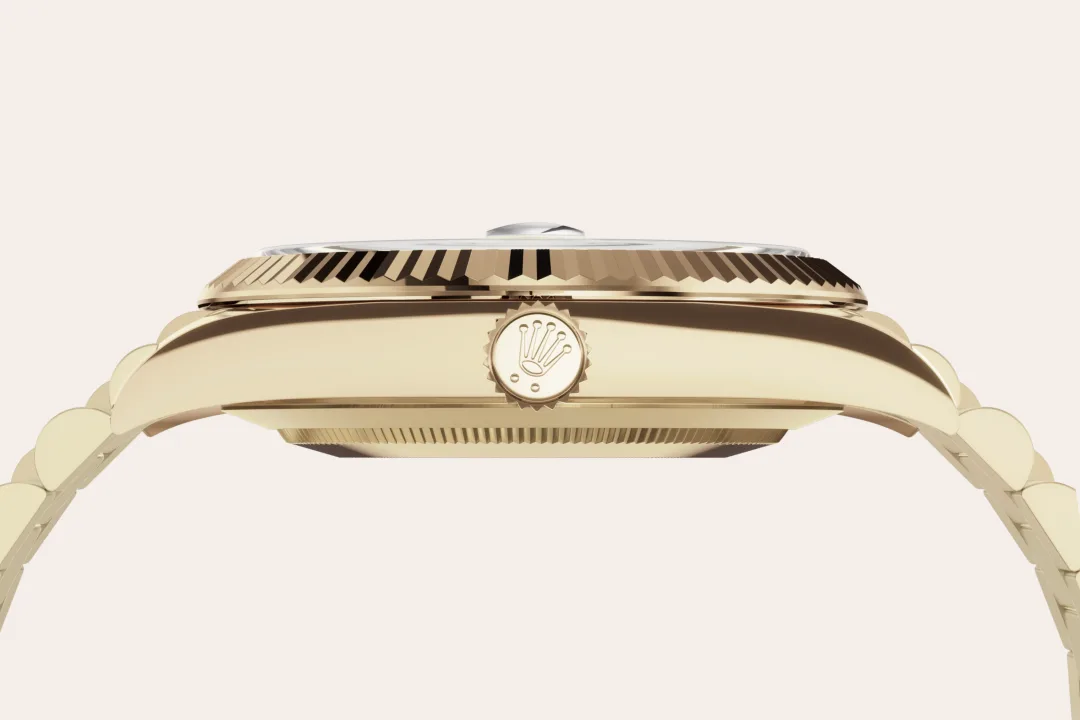 Rolex Day-Date 40 in yellow gold with a white dial, fluted bezel, and President bracelet, m228238-0042 - Crisson Rolex Day-Date 40 in yellow gold with a white dial, fluted bezel, and President bracelet, m228238-0042 - Crisson